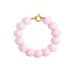 Roze kralenarmband met grote kralen en ronde sluiting