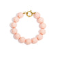 Lichtroze kralenarmband met grote kralen en ronde sluiting